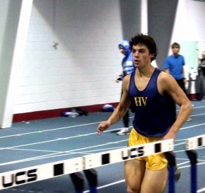Cameron-Vaughn-edit Sprinting around the track, Cameron Vaughn (11) represents Hidden Valley at an indoor track meet.