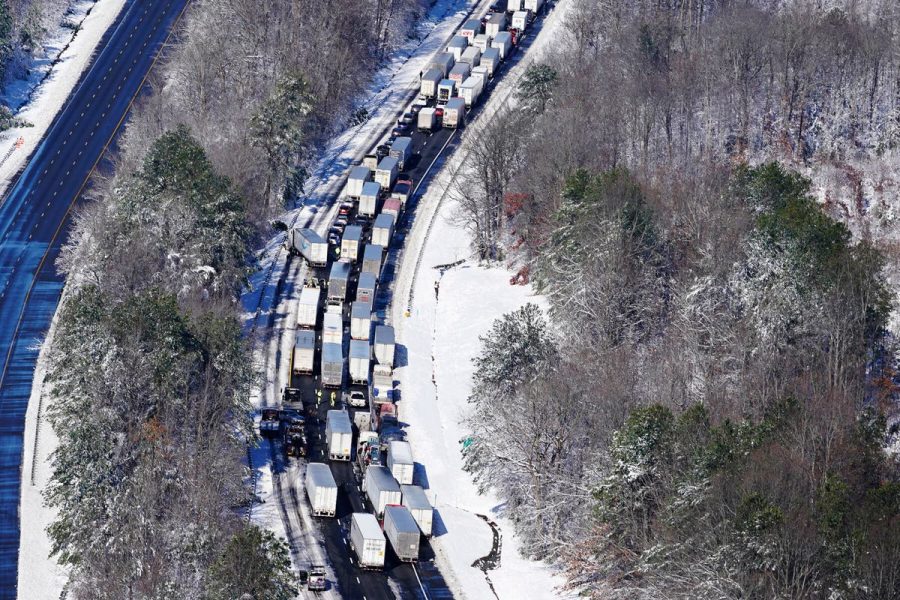 Drivers wait for the traffic to be cleared in Carmel Church, Virginia 