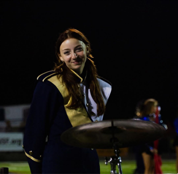 Halftime performance with the band pit. Isabella Shellnutt (11). 