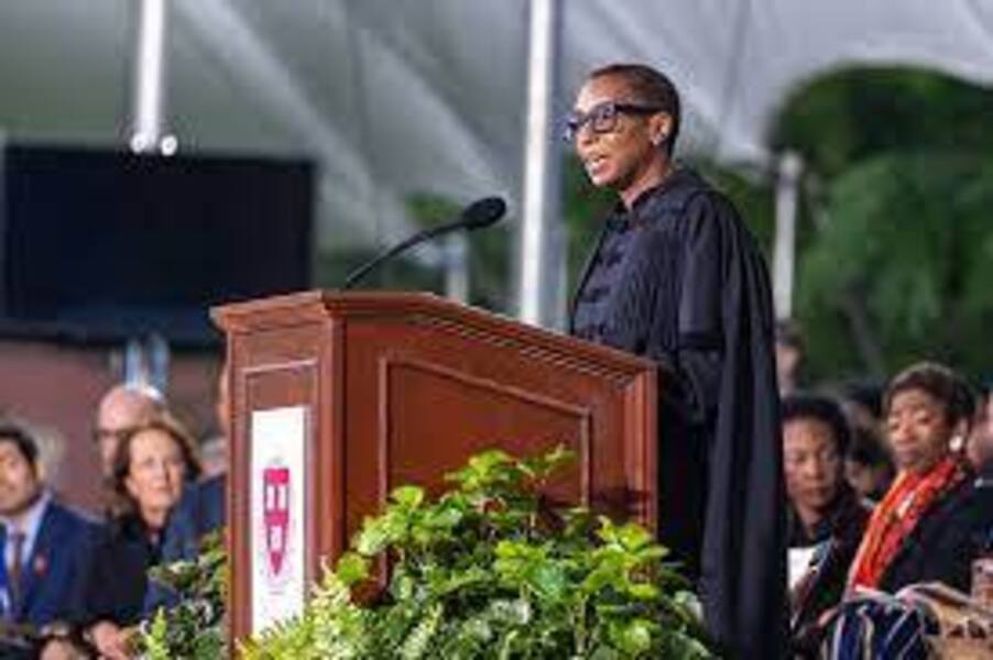 Claudine Gay speaking on podium.