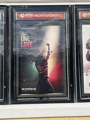 Bob Marely: One Love movie poster displaying a performance of Marley.