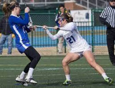 Womans lacrosse game at the school Morgan played at in college. 