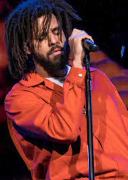 J. Cole performing.