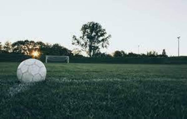 Soccer field as the sun is setting, similar to where the HVHS teams play and practice.