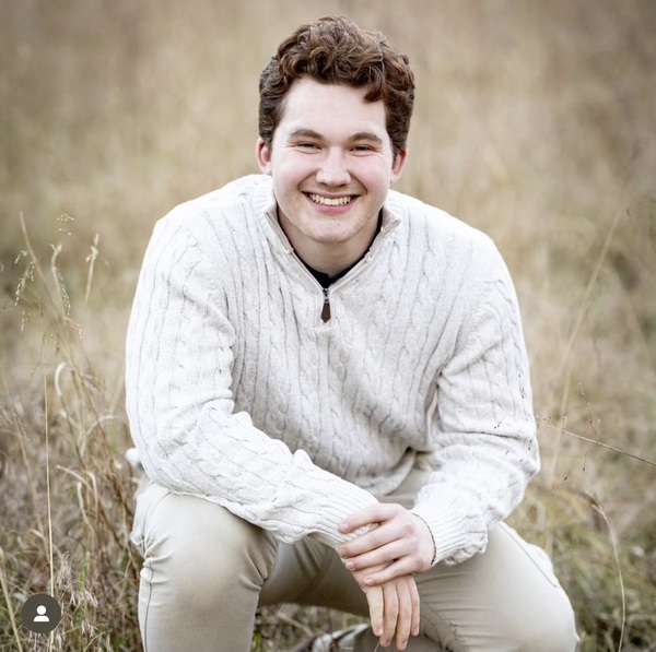 Brennan Metz posing for a photo.