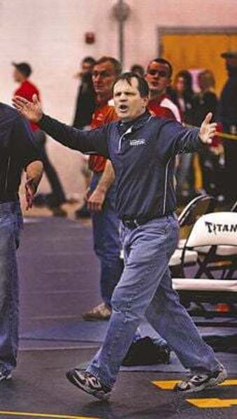 Mr. Broughman, beloved wrestling coach and math teacher.