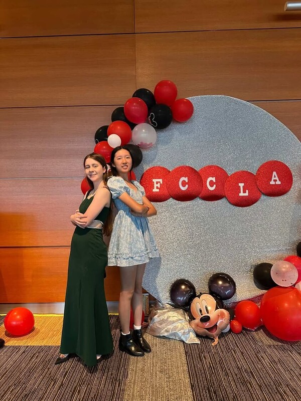 Julia Pearce (11) poses with her friend, supporting FCCLA!