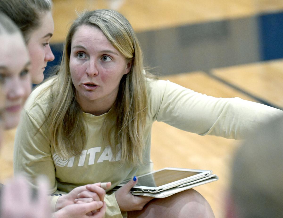 Mrs. Quesenberry coaching volleyball.