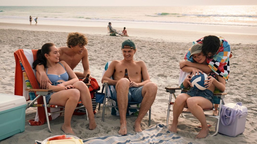 Belly, Conrad, Jeremiah, and friends spending the summer at Cousins Beach in the show The Summer I Turned Pretty.