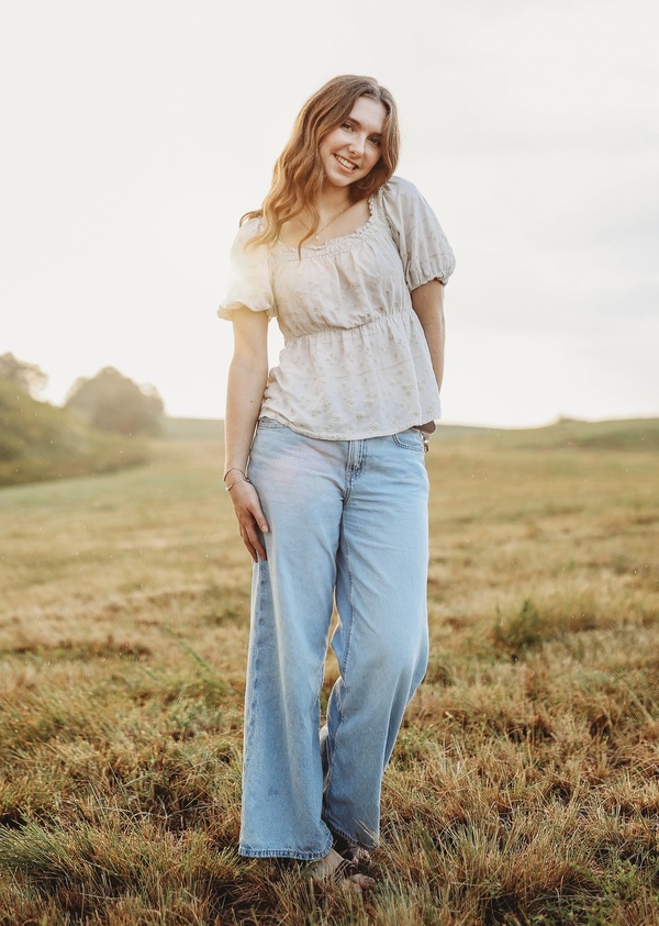 Kate Chadwick poses for the camera during her senior photo shoot