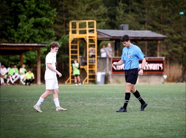 Truett on the pitch in a heated match at rival Cave Spring.