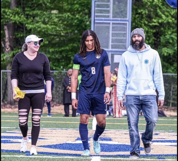 Hamilton is recognized on the soccer field during Senior Night.
