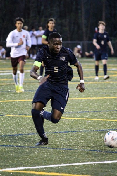 Majesty Princely tackles the soccer field in a fierce game.